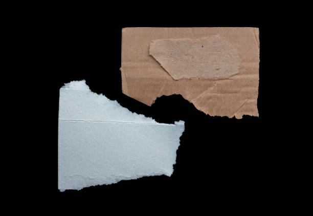 istock Ripped paper piece isolated on a black background 1784001961