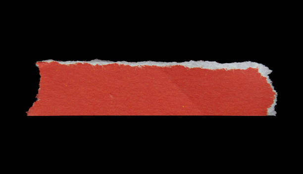 istock Ripped paper piece isolated on a black background 1784002274