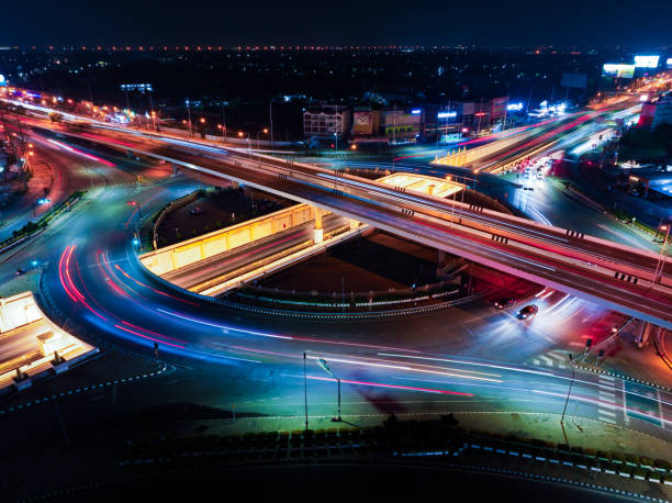 istock Expressway top view, Road traffic an important infrastructure, Drone aerial view fly in circle, traffic transportation, Public transport or commuter city life concept of economic and energ, transport. 1784003334