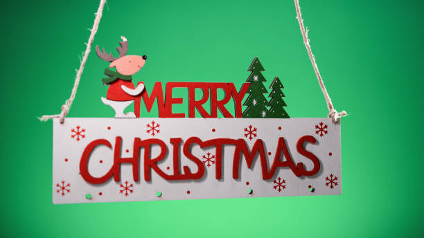istock Merry Christmas sign decoration with green background 1784015369