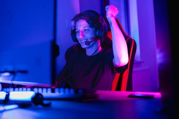istock Friends live-streaming while playing multiplayer online game in living room at home 1784017590