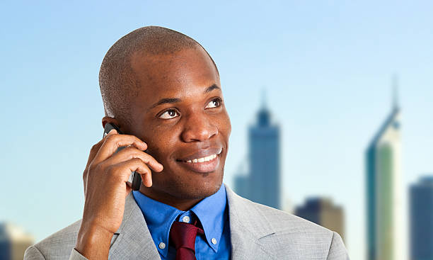 istock African businessman at phone 178402508