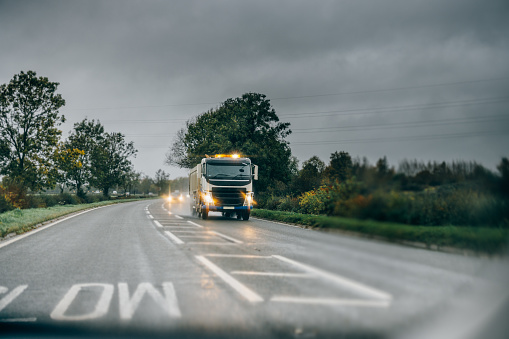 Lory heavy weight transport on a rainy day UK roads