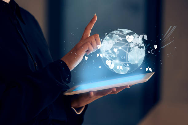 istock Hands, tablet and hologram earth in night at office for research, analysis and web design for tech innovation. Woman, mobile touchscreen and iot with 3d globe ux, search or website for connectivity 1784032516