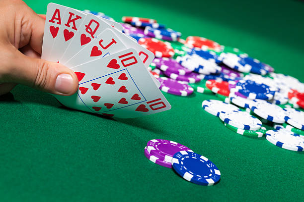 istock Colorful poker chips and royal flush 178404151