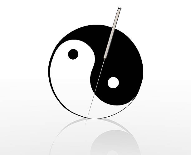 acupuncture needle and yin yang sign