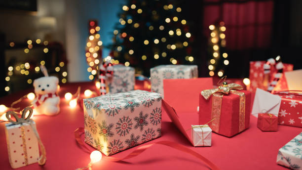 istock Table full of gifts and presents background 1784043012