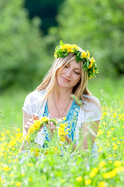 istock woman with flower wreath 178404909