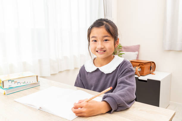 istock A girl studying at home. 1784055652