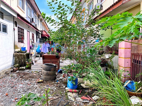 An unkept and messy back yard in a rural residential area in Klang - Selangor