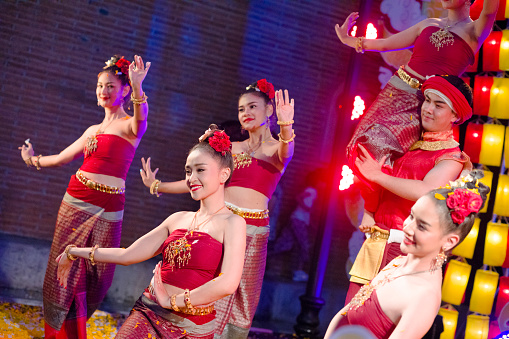 Nakhonsawan,Thailand -MAY 11,2019 :Unidentified dancers group perform at the Parade of Rocket festival “Boon Bang Fai” The celebration for plentiful rains during the rice plant season