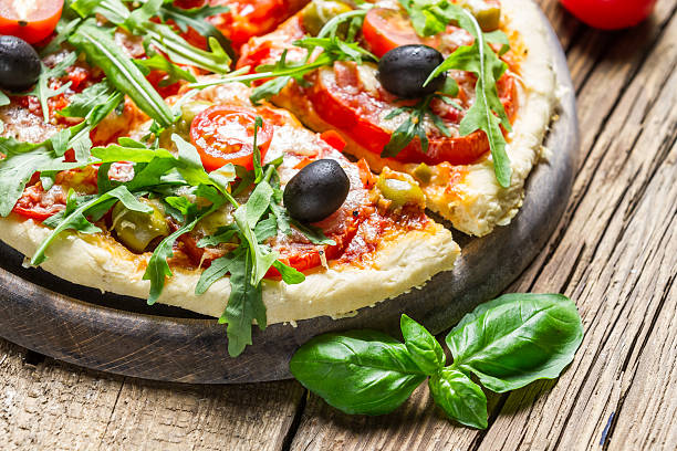 istock Hot pizza made of fresh ingredients 178408949