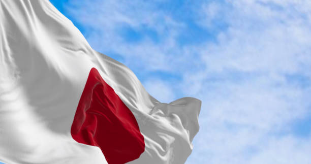istock Japan national flag waving in the wind on a clear day 1784098964