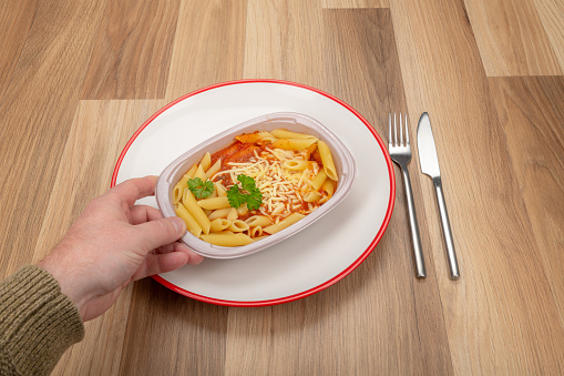 Plating a frozen TV dinner ready meal