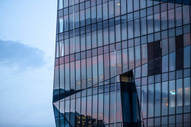 istock Modern Business Building with Glass Facade in Dawn's Luminescent Elegance 1784103484