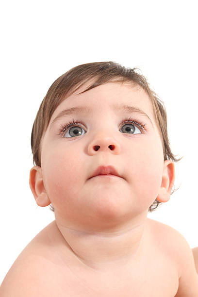 istock Baby watching attentive with a big blue eyes 178410511