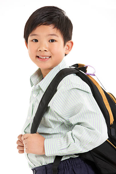 istock Studio Shot Of Chinese Boy In School Uniform 178410525