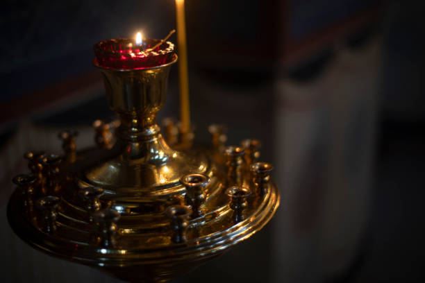 istock Candles in the temple. Wax candles. Religious rite. 1784111739