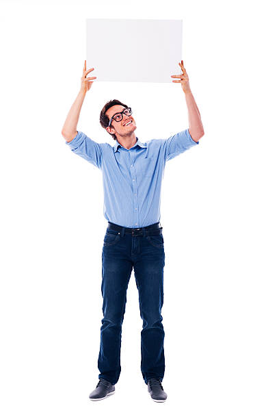 istock Handsome man holding a blank sign overhead 178411809