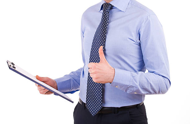 istock Businessman holding a clipboard. 178412176
