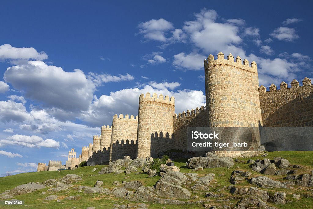 Medieval city wall in Avila, Spain Medieval city wall built in the Romanesque style, Avila (City of Stones and Saints), Spain Ancient Stock Photo