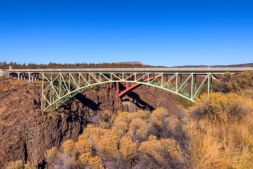 Old and new bridges the older turned into a pedestrian bridge crosses over the Crooked River Gorge in eastern Oregon, USA