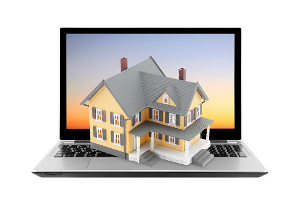 istock Yellow house on laptop 178413451