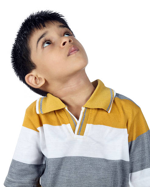 istock Indian Little Boy Looking up 178413730