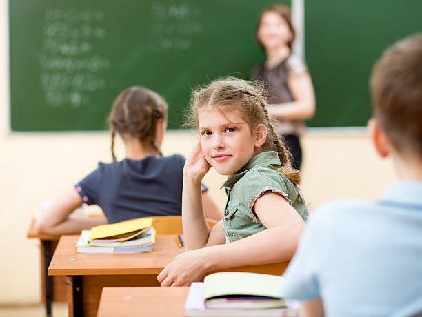 istock School children in classroom at lesson 178414463