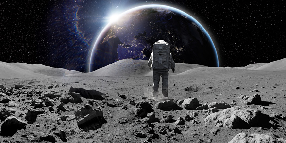 An astronaut dressed in full spacesuit with backpack on the lunar surface, off the ground under low gravity looking towards the sun rising over earth. With copy space. Earth image from NASA https://eoimages.gsfc.nasa.gov/images/imagerecords/90000/90008/europe_vir_2016_lrg.png