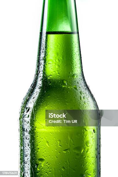 Bottle Of Beer With Drops Isolated On White Stock Photo - Download Image Now - Alcohol - Drink, Beer - Alcohol, Beer Bottle