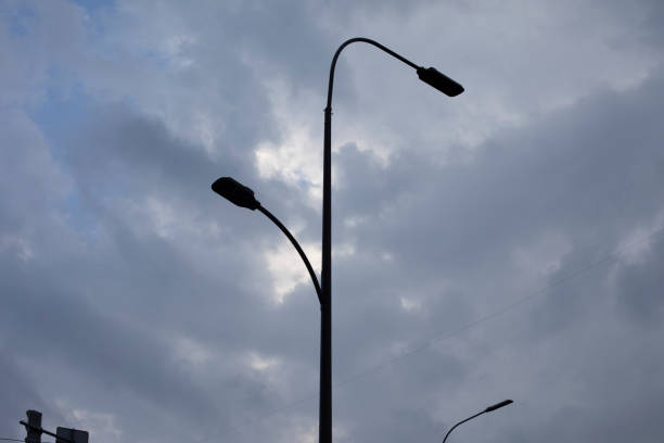 istock Pillar against sky. Electric pole in city. Wire on sky background. 1784160819