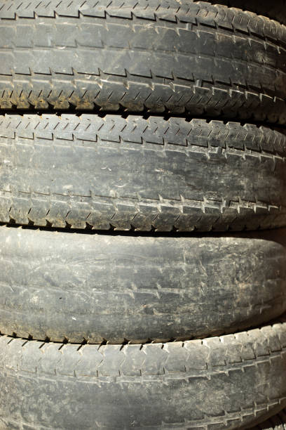 Old Car Wheels. Rubber Tires. Wheels in a landfill. Old tires.