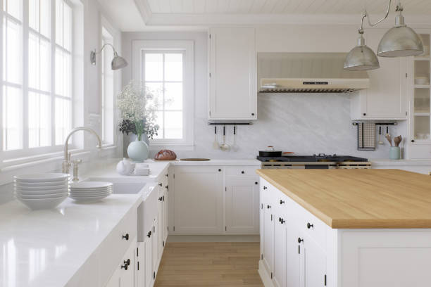istock White U-shaped kitchen with windows, kitchen appliances and utensils. Stylish, bright kitchen in a traditional style. 3D rendering 1784163586