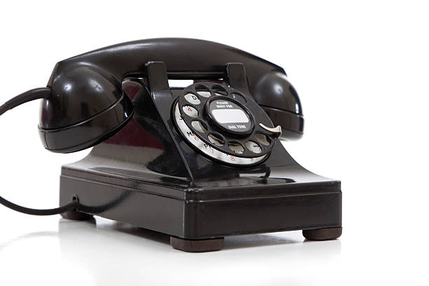 istock Retro black rotary phone on a white background 178416579