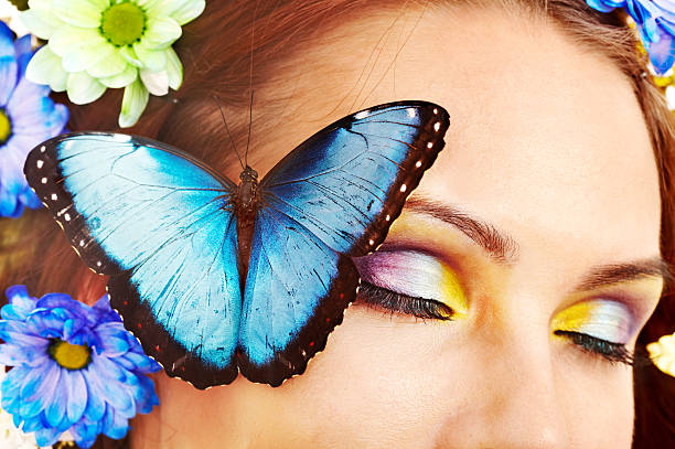 istock Woman with flower and  butterfly. 178416879
