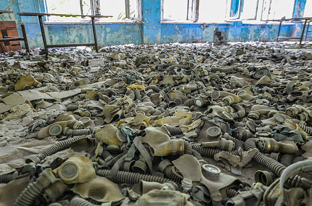 chernobyl after the disaster Pripyat, Ukraine – August, 2012: Hundreds of gas masks in the the abandoned school cafeteria in the town of Pripyat just 5km (3.1m) away from the Chernobyl Nuclear Power Plaint. (Photo by Alex Kühni) chornobyl photos stock pictures, royalty-free photos & images
