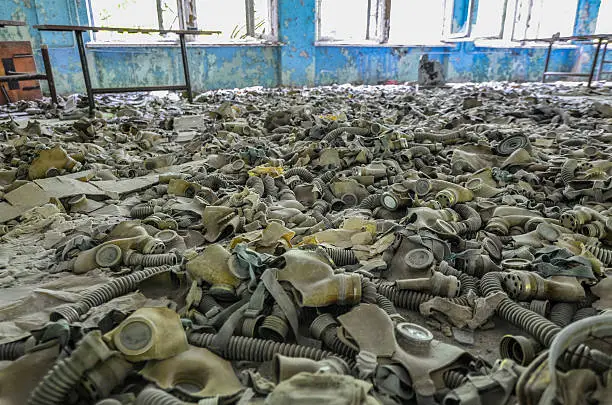 Pripyat, Ukraine – August, 2012: Hundreds of gas masks in the the abandoned school cafeteria in the town of Pripyat just 5km (3.1m) away from the Chernobyl Nuclear Power Plaint. (Photo by Alex Kühni)