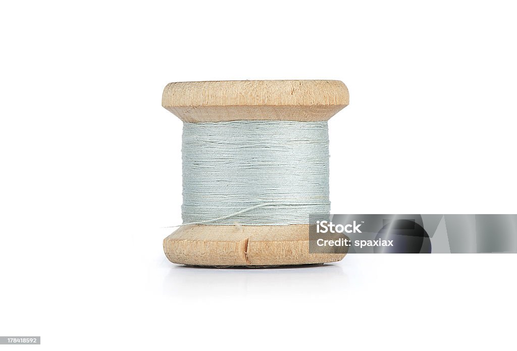 old thread spool old thread spool isolated on white Close-up Stock Photo
