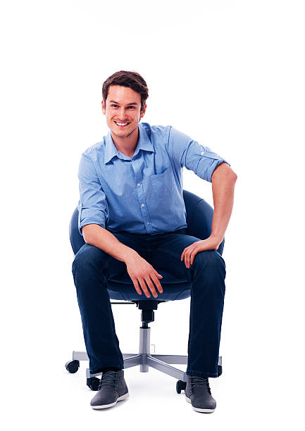 istock Handsome male sitting on chair 178418647