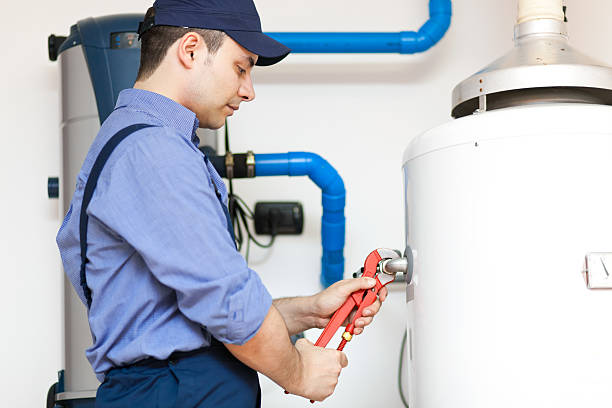 istock Technician repairing an hot-water heater 178418852