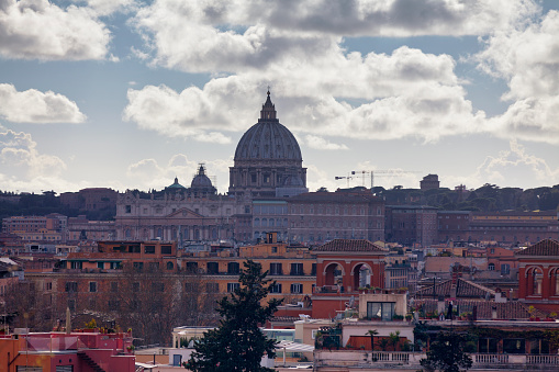 Rome, Italy - March 17 2018: St. Peter's Basilica in the Vatican City overlooking the city of Roma, Italy.