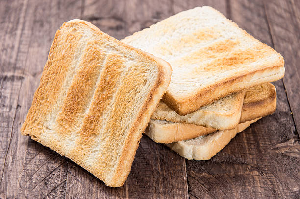 istock Heap of toast on wood 178419637