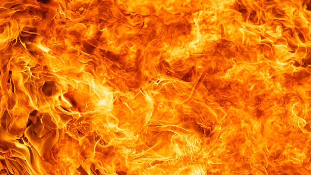 blaze fire flame background - yanmış stok fotoğraflar ve resimler