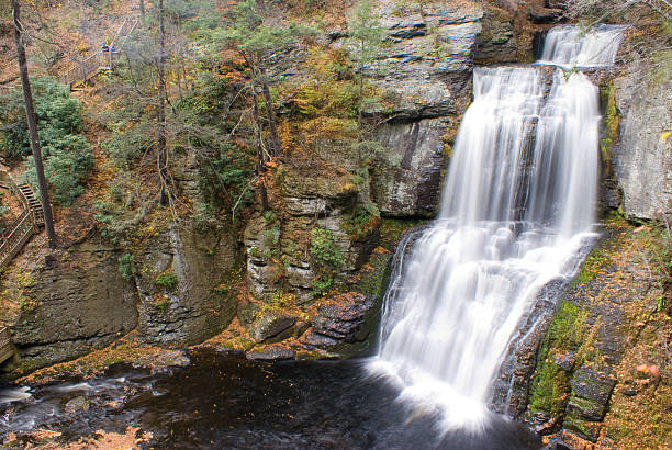 Bushkills Falls (main waterfall) Bushkill Falls is a series of eight waterfalls located in Northeast Pennsylvania's Pocono Mountains. The main waterfall is the tallest, cascades over 100 feet (30 m) the poconos stock pictures, royalty-free photos & images
