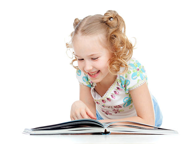 istock cute happy little girl reading a book 178421165