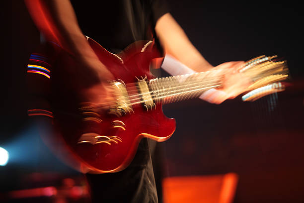 istock Guitarist at nightclub, blur in moving 178421319