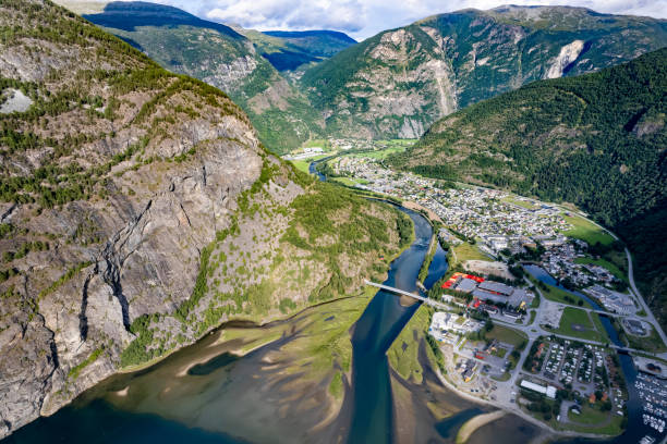 Aerial view above Lærdalsøyri in Norway Aerial view above fjord of  Lærdalsøyri in Norway at sunset stegastein viewpoint stock pictures, royalty-free photos & images