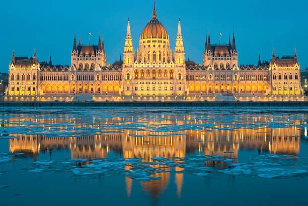 Hungarian parliament building at winter, ice drift on Danube river (Budapest)