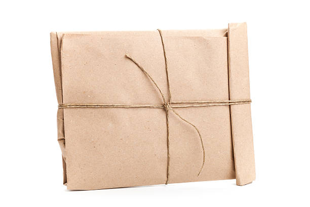 istock Closed envelope tied with a rope isolated on white background 178423784